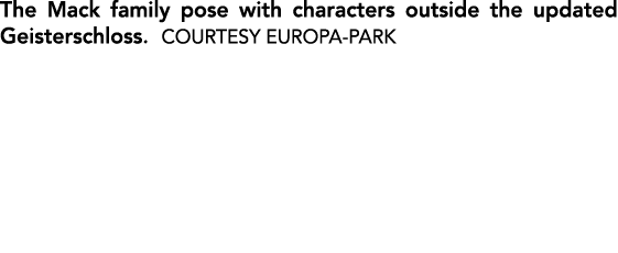 The Mack family pose with characters outside the updated Geisterschloss. COURTESY EUROPA PARK